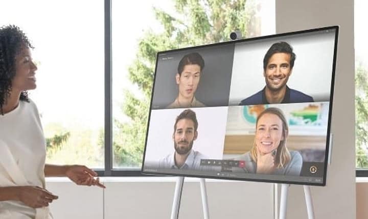 woman on video call using surface hub 2s